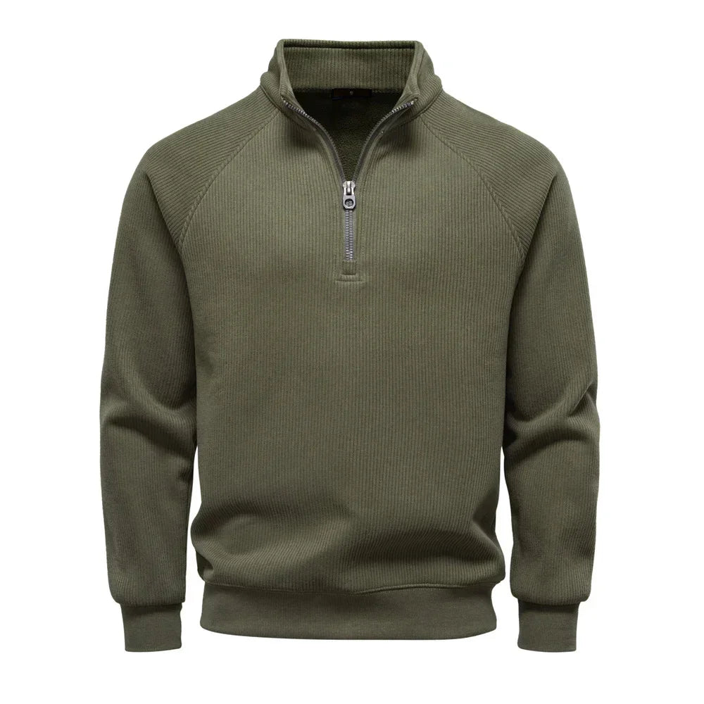 Men's olive green quarter-zip sweater with stand collar and ribbed cuffs and hem.