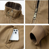 Tan military jacket details: sherpa collar, metal zipper, pocket, and ribbed cuff.