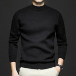 Black high-neck knit sweater with long sleeves and ribbed hem and cuffs.