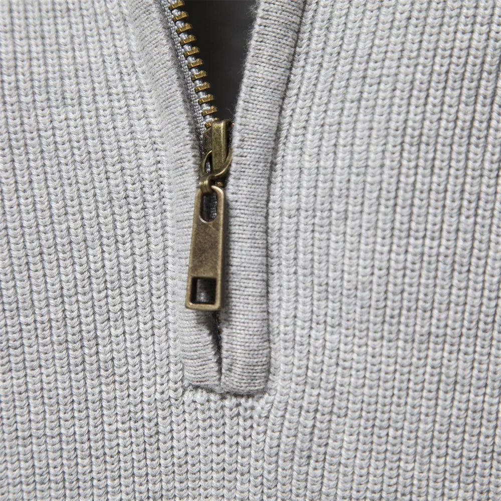 Men's light gray knit pullover with half-zip and metal zipper pull