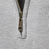 Men's light gray knit pullover with half-zip and metal zipper pull