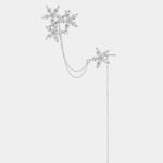 Silver floral ear cuff design with two starburst petals and long dangling chain