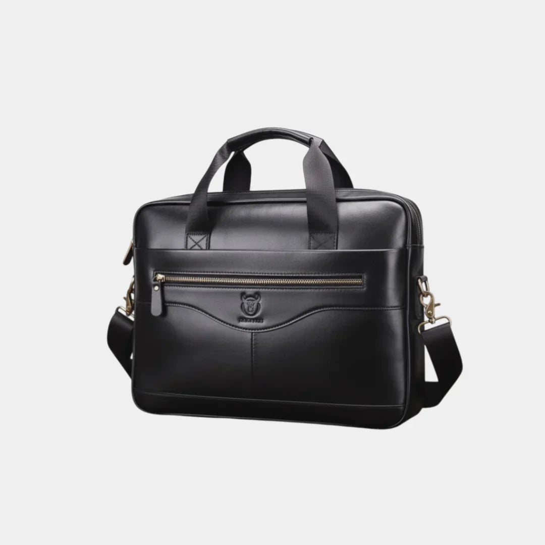 Black leather briefcase with top handle, front zipper pocket, and shoulder strap.