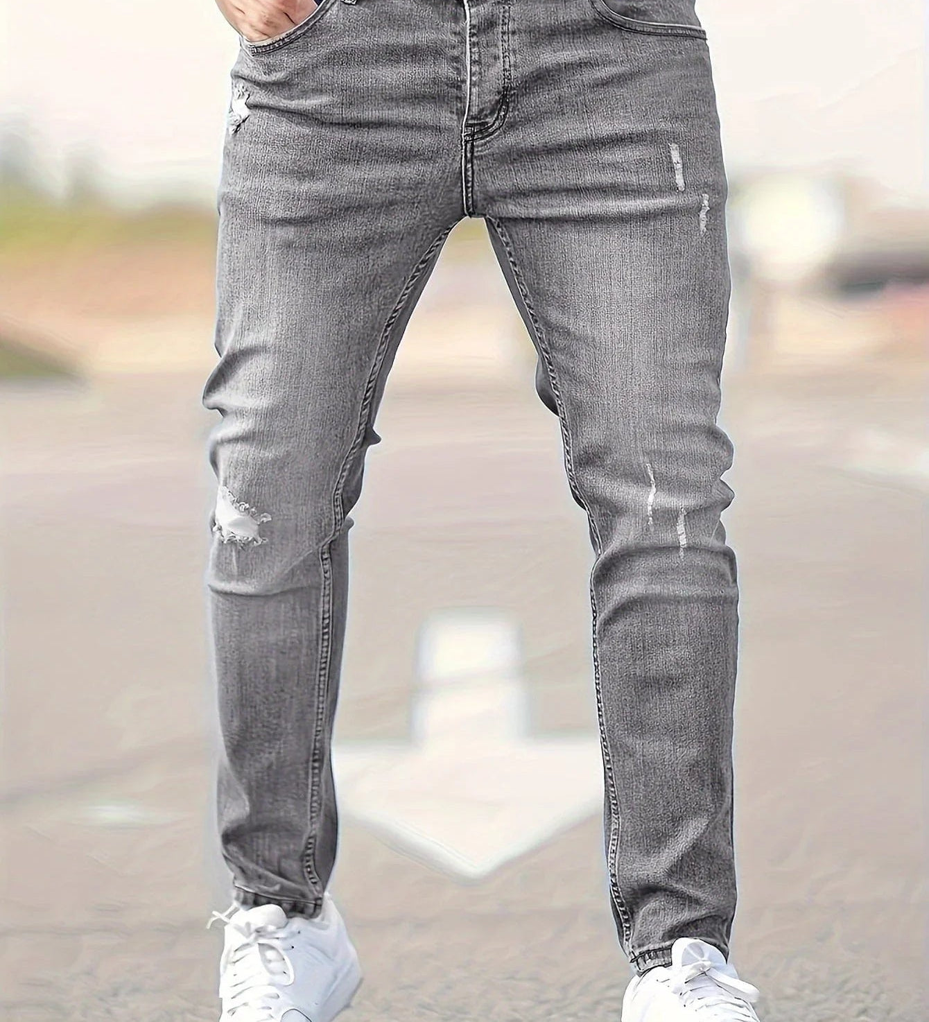 Slim-fit ripped jeans in gray wash, ripped knee details and tapered fit