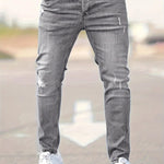 Slim-fit ripped jeans in gray wash, ripped knee details and tapered fit