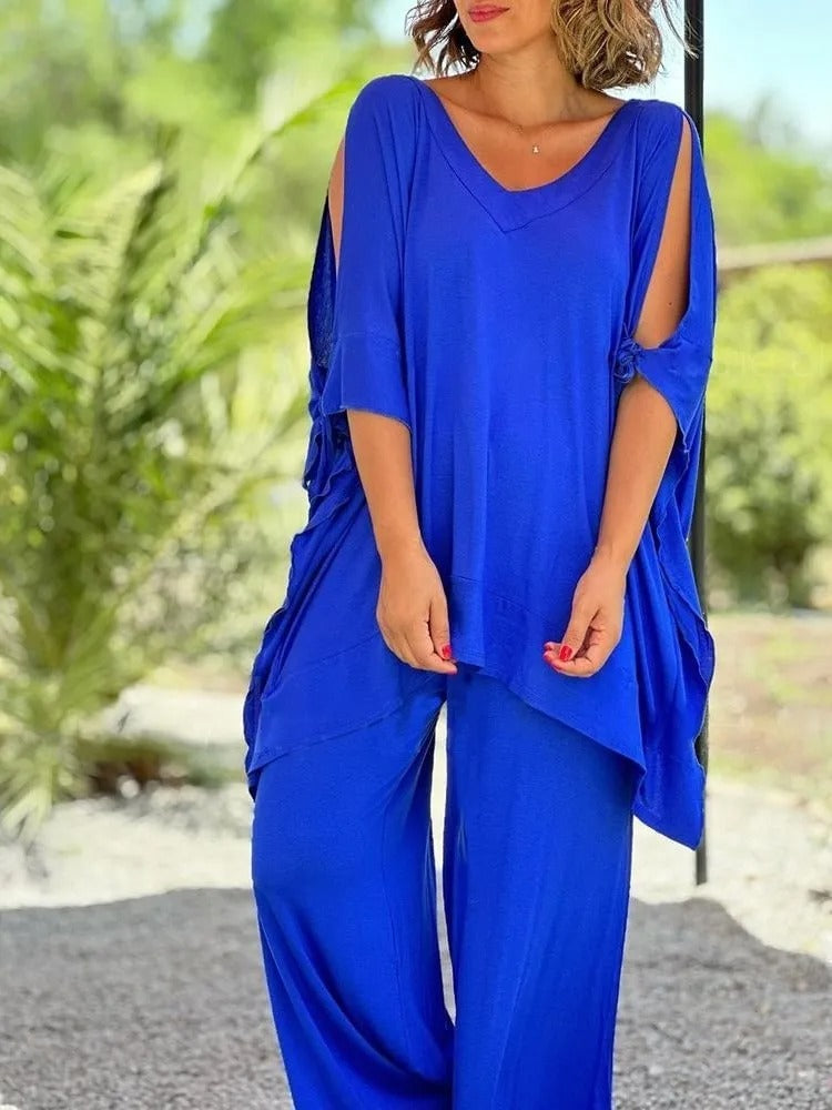 Blue V-neck tunic with draped side panels and wide-leg pants set
