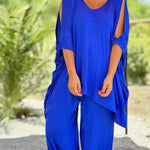Blue V-neck tunic with draped side panels and wide-leg pants set
