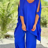 Blue V-neck tunic with draped side panels and wide-leg pants set