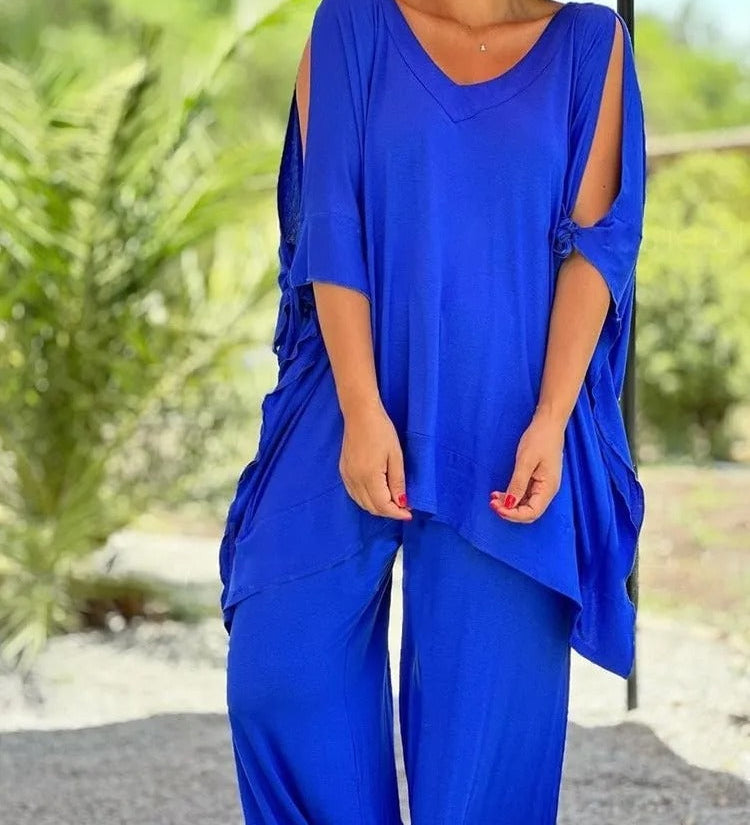 Blue V-neck tunic with draped side panels and wide-leg pants set