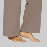 Taupe wide-leg pant hem detail with stitched seam and roomy straight leg.