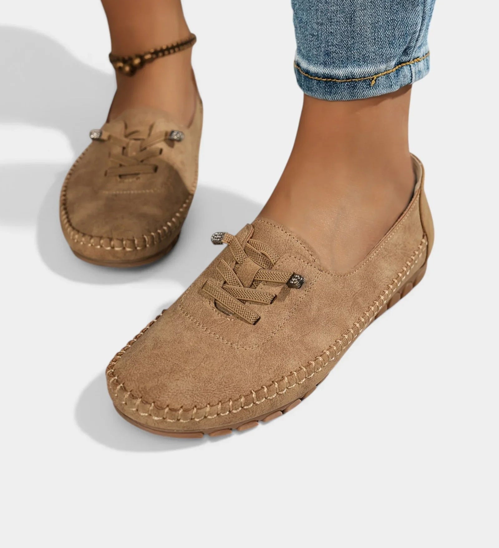 Brown suede lace-up loafers with stitched moc toe and low heel sole.
