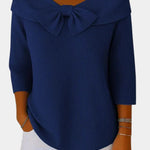 Navy blue ribbed knit top with bow-knot neckline and 3/4 sleeves