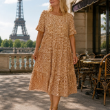Brown polka dot midi dress with short sleeves and gathered waist