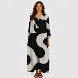 Black and white patterned summer dress with V-neck and 3/4 sleeves