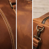 Leather bag close-up: contrast stitching, panel texture, and brass hardware rings