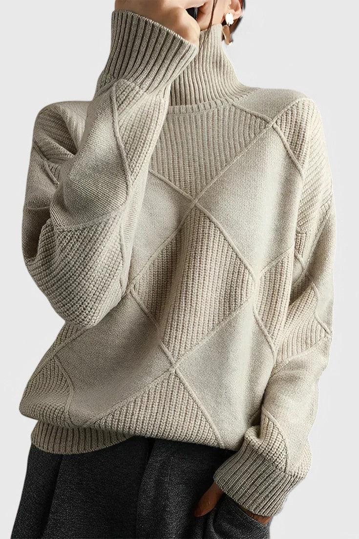 Ivory turtleneck sweater with ribbed knit and diamond pattern on the front