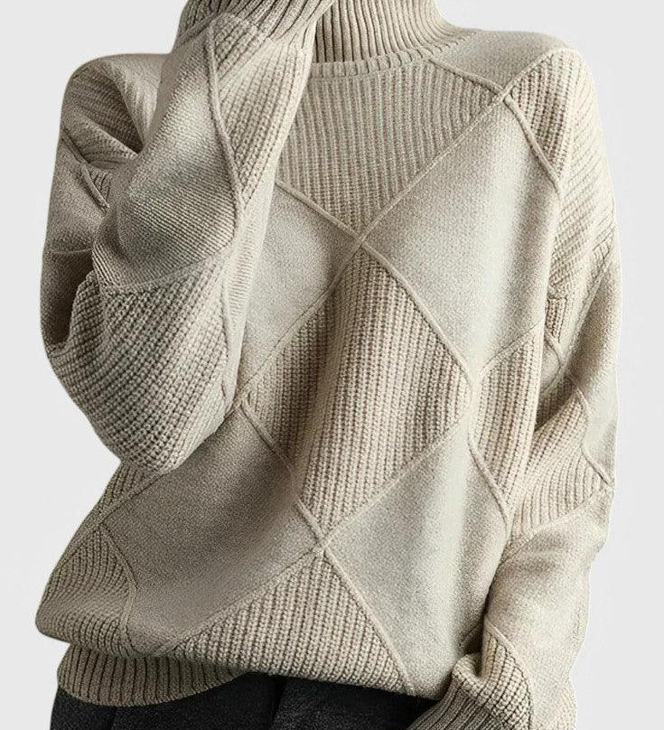 Ivory turtleneck sweater with ribbed knit and diamond pattern on the front