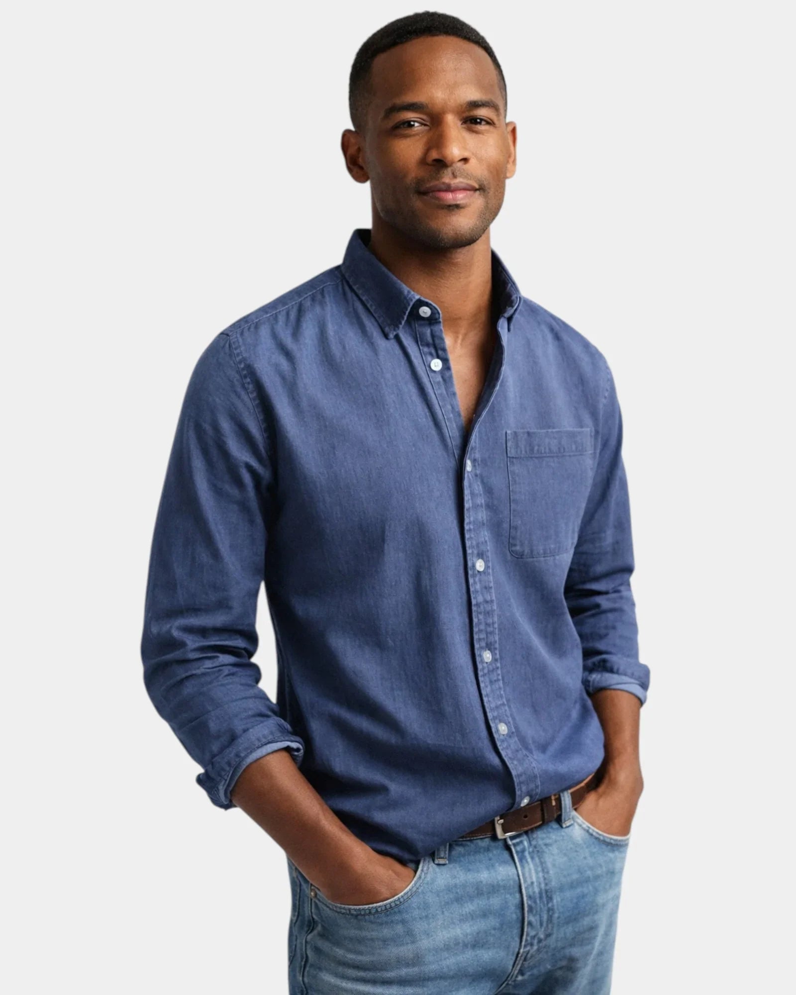 Men’s denim-blue casual button-up shirt worn with jeans