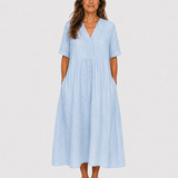Blue midi dress with V-neck, short sleeves, gathered waist and relaxed fit
