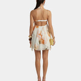 Women's floral mini dress, open back with thin cross straps and ruffled hem