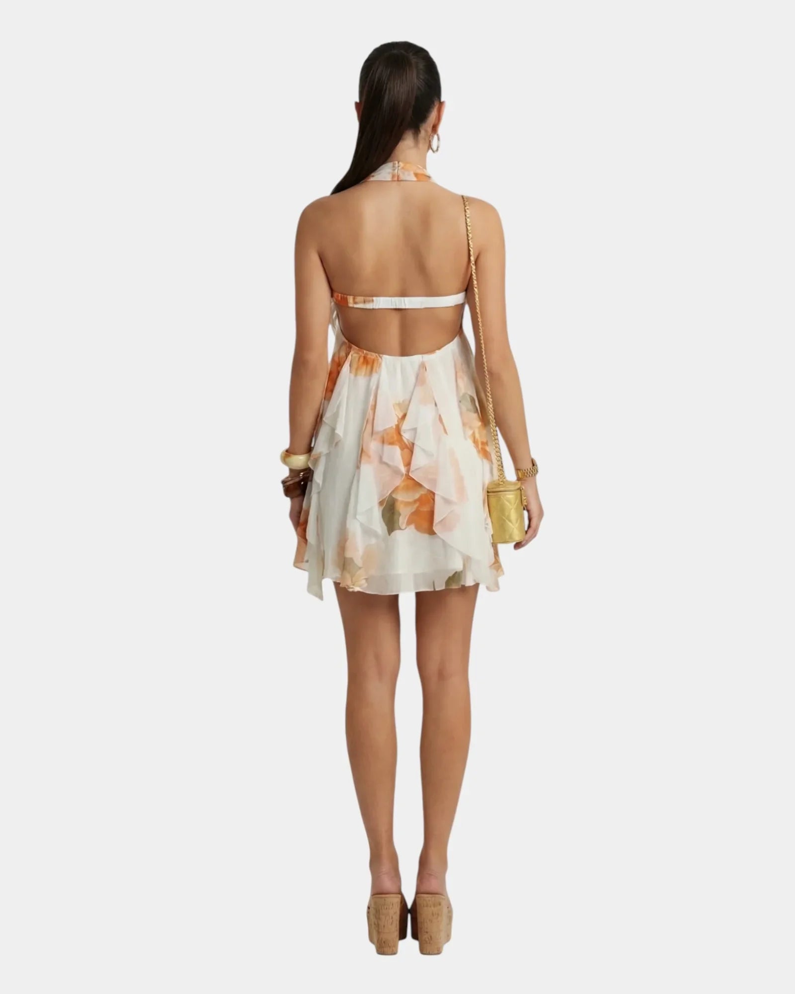 Women's floral mini dress, open back with thin cross straps and ruffled hem