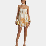 Women's floral mini dress with thin straps and gathered ruffle skirt