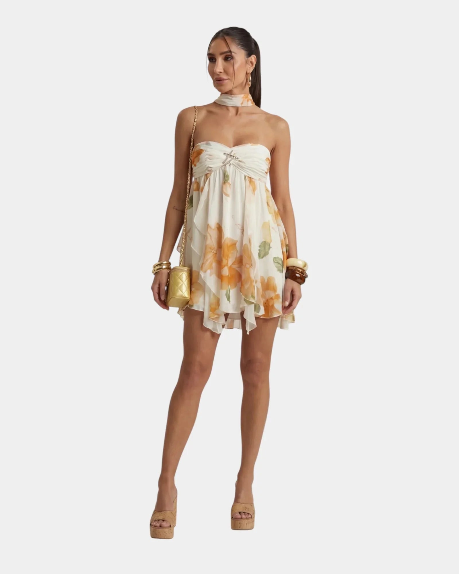 Women's floral mini dress with thin straps and gathered ruffle skirt