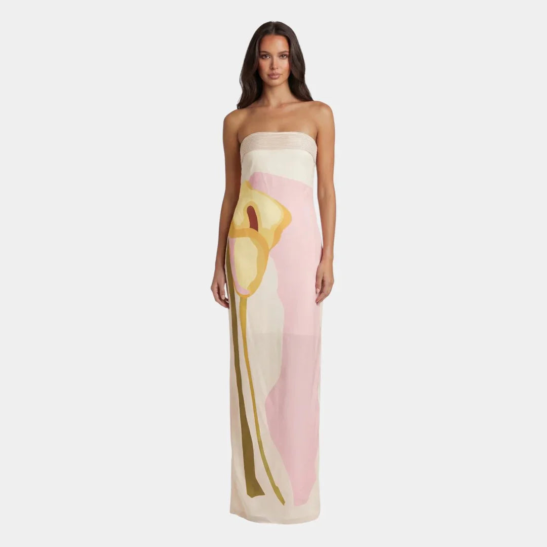 Strapless maxi dress with abstract face print in pink, yellow, and cream