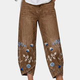 3/4-length casual pants, brown with blue floral bird print on lower panels