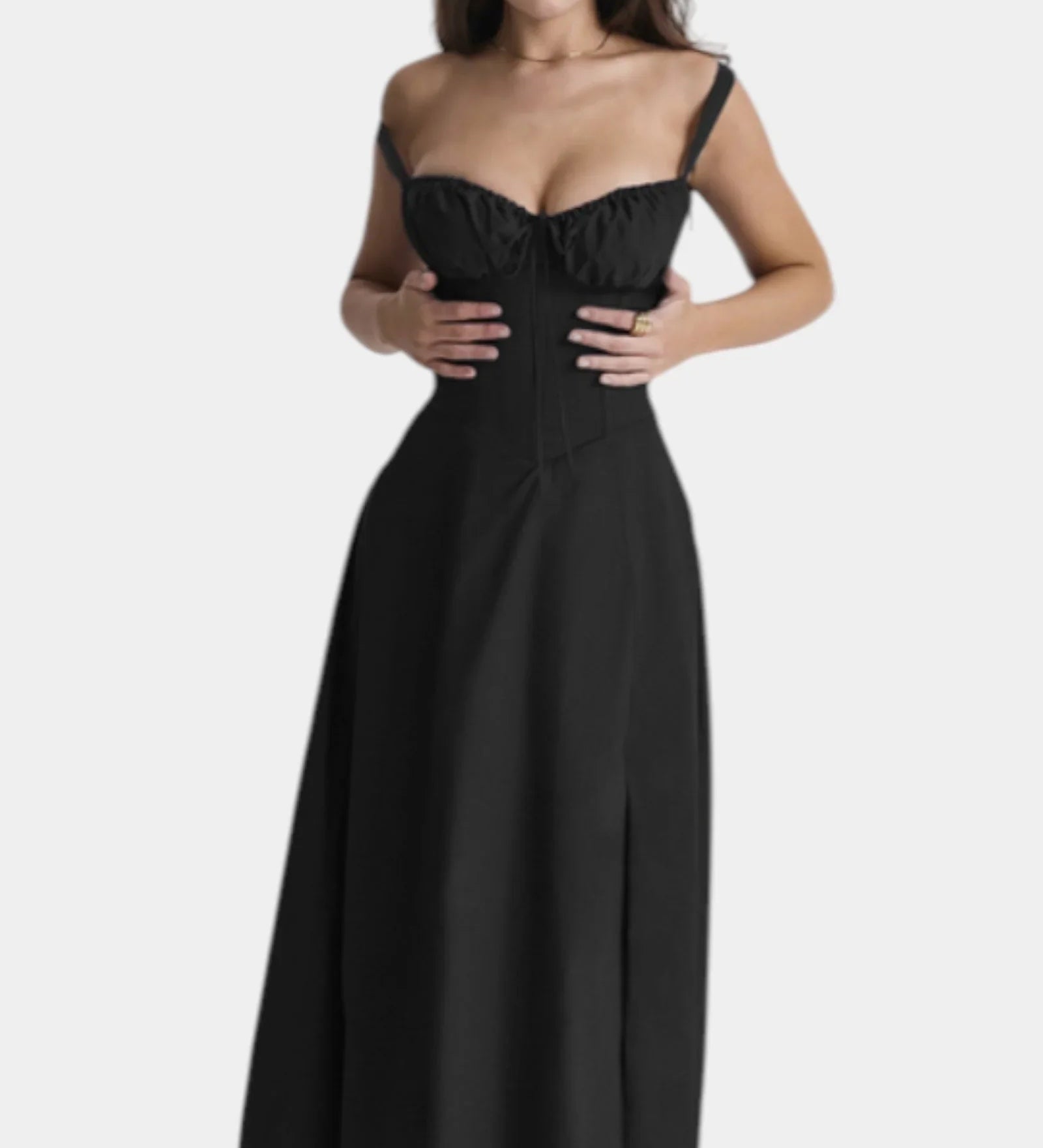 Black midi dress with spaghetti straps and fitted skirt with subtle bust ruching