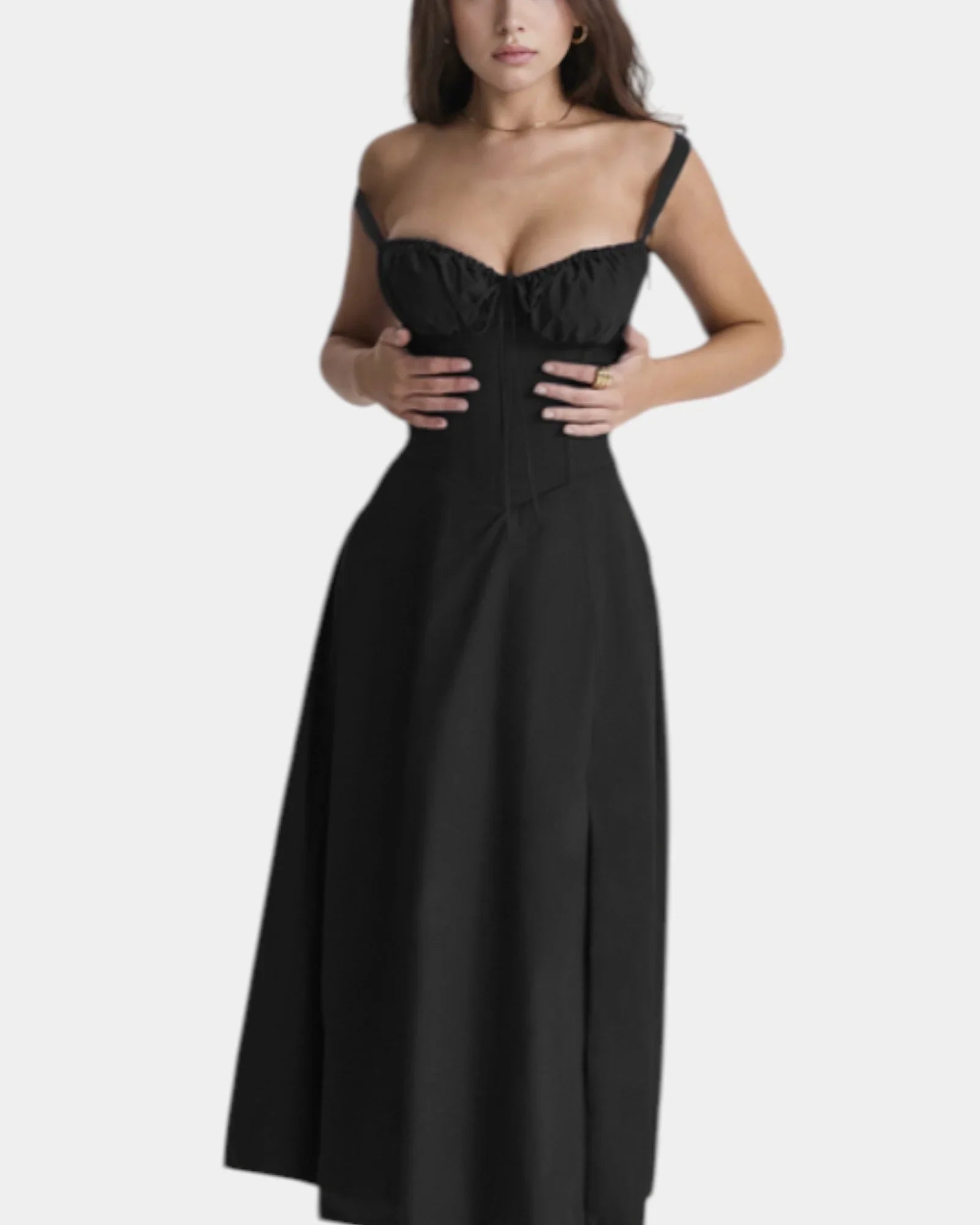 Black midi dress with spaghetti straps and fitted skirt with subtle bust ruching
