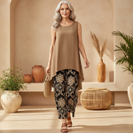 Taupe sleeveless tunic and black wide-leg pants with gold ornate paisley pattern
