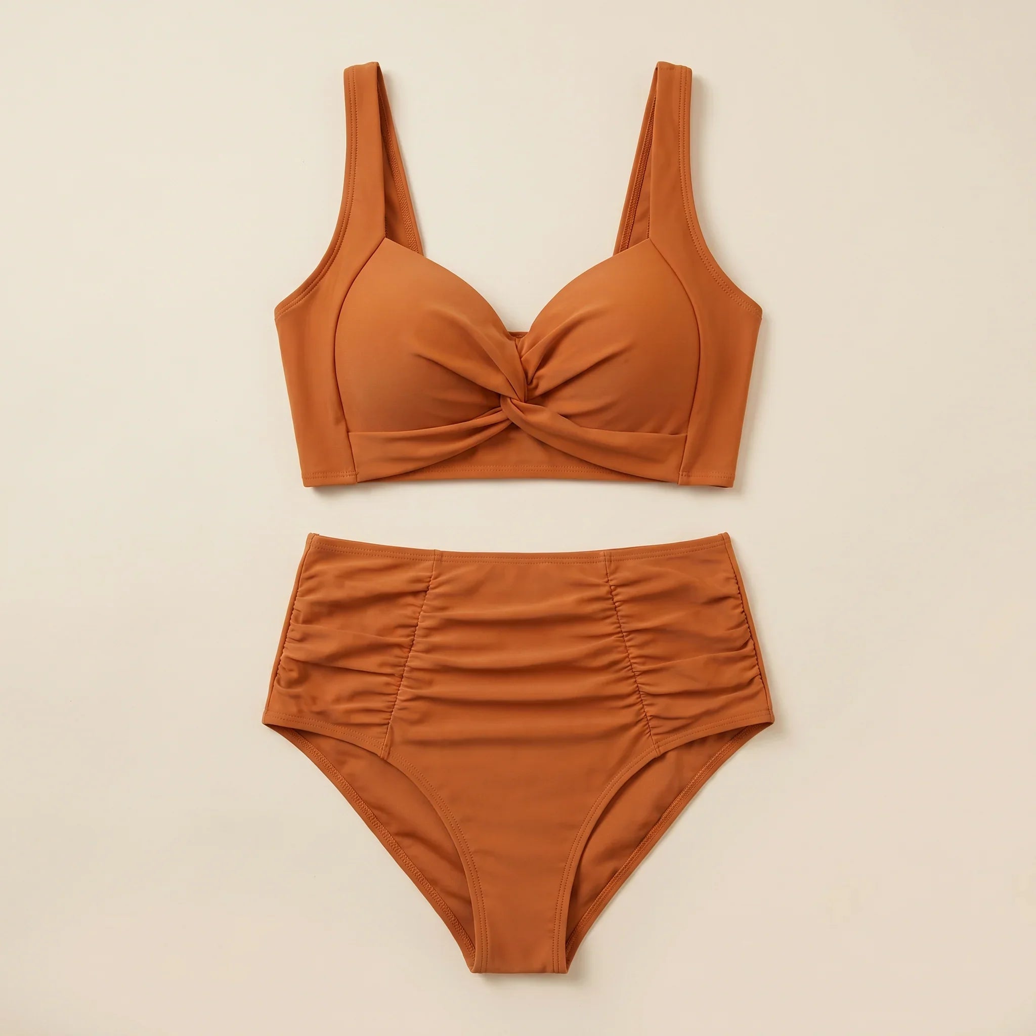 Women’s orange bikini set: twist-front bra top with high-waisted swim bottoms