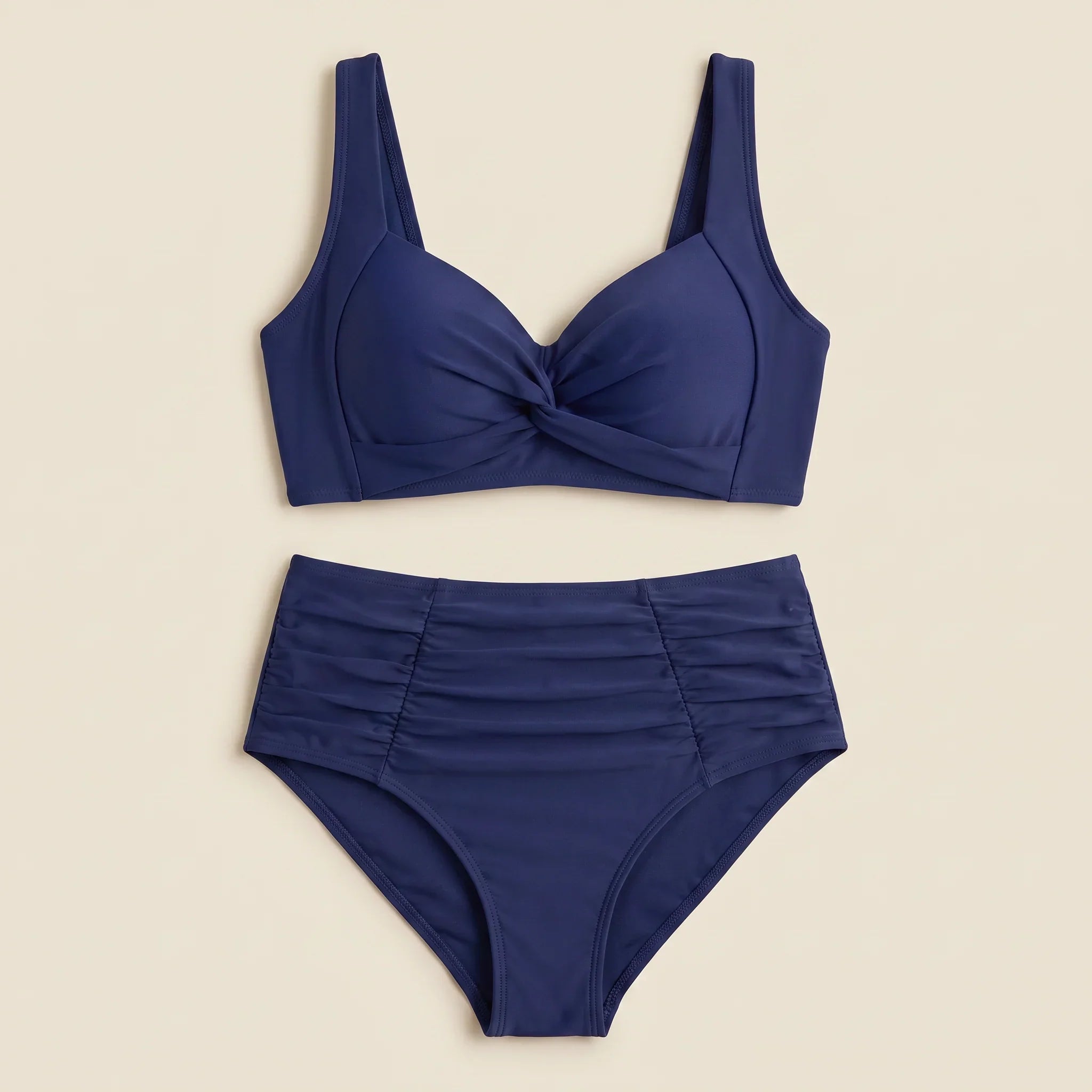 Women’s navy blue bikini set: twist-front bra top with high-waisted swim bottoms