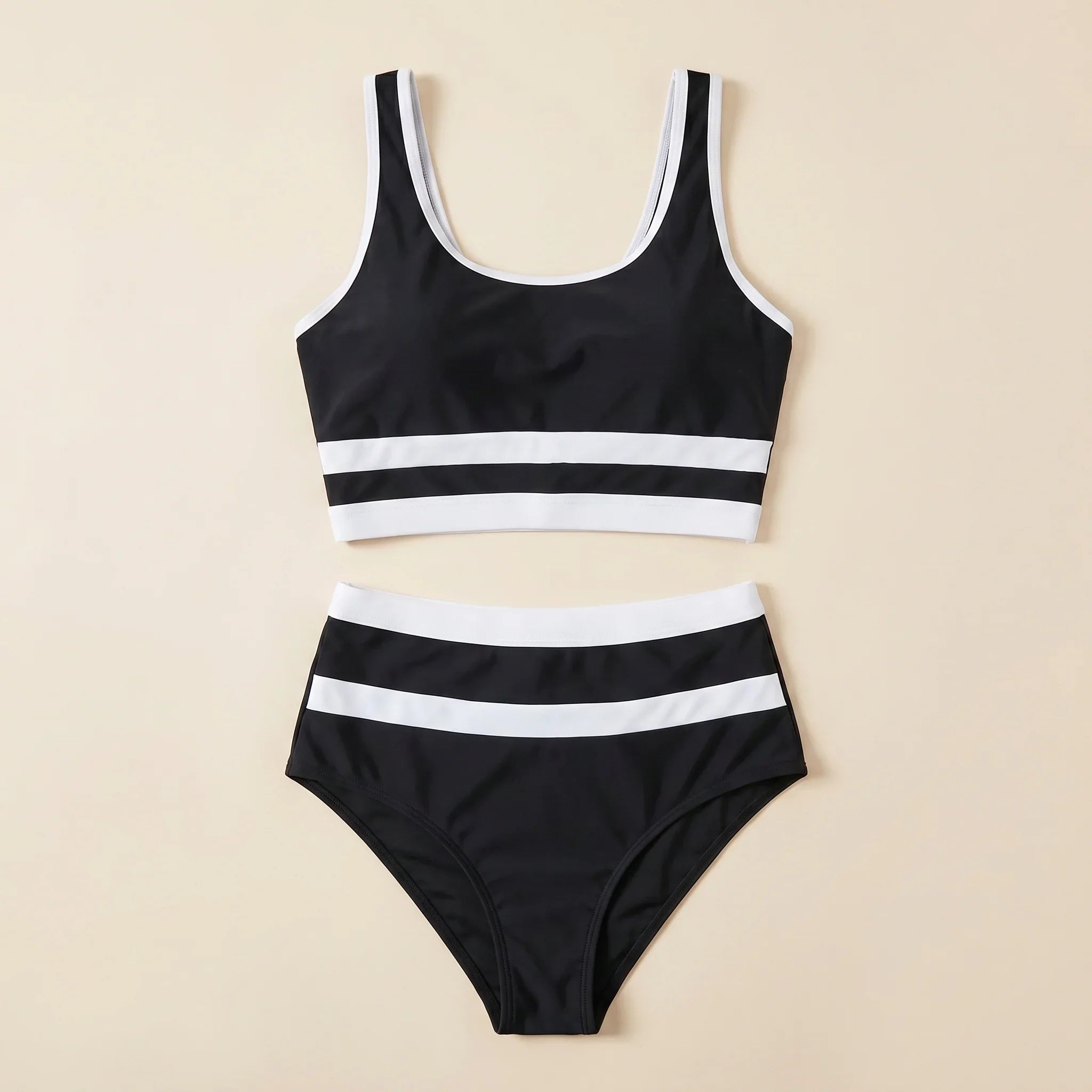 Black and white striped bikini set, scoop-neck crop top with matching high-cut bottoms