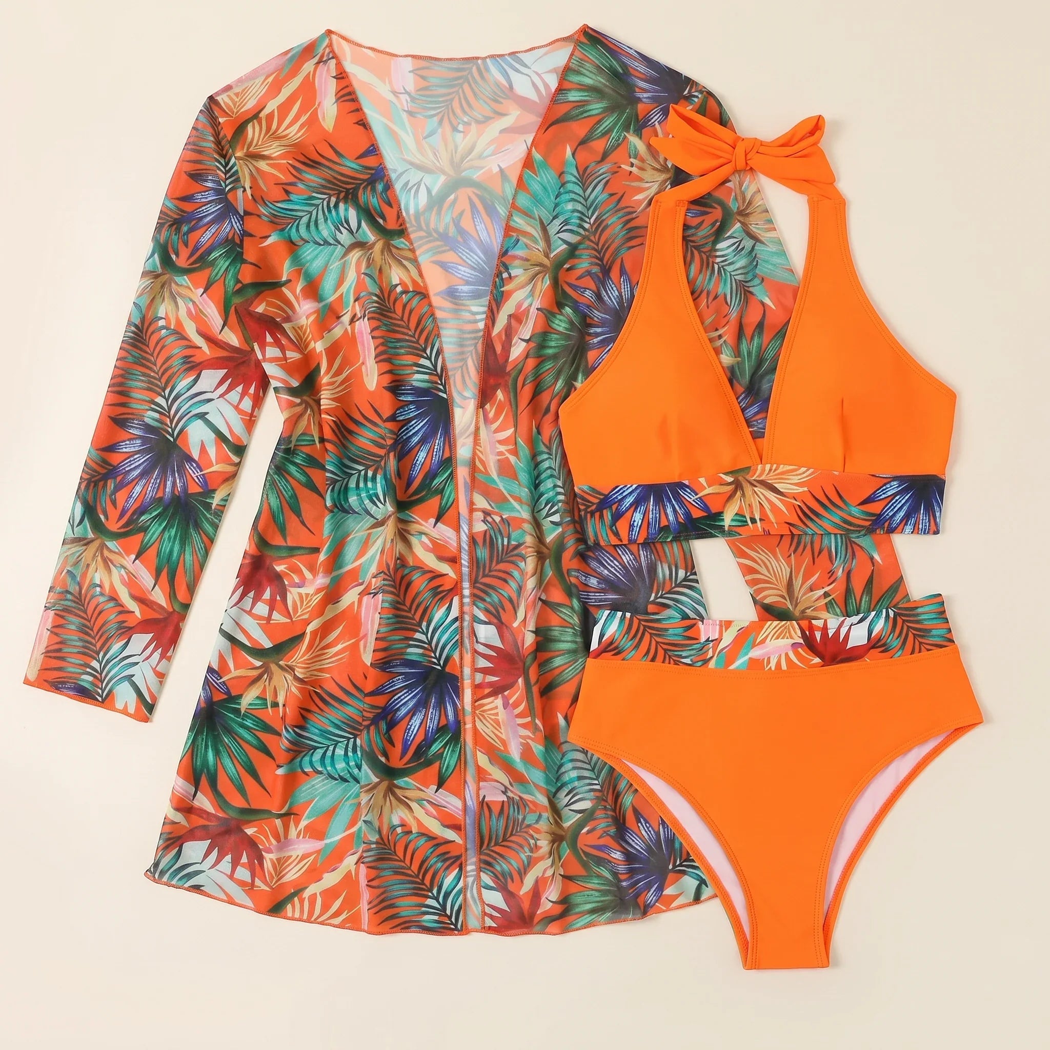Orange tropical swim set with bow halter bikini and long floral cover-up