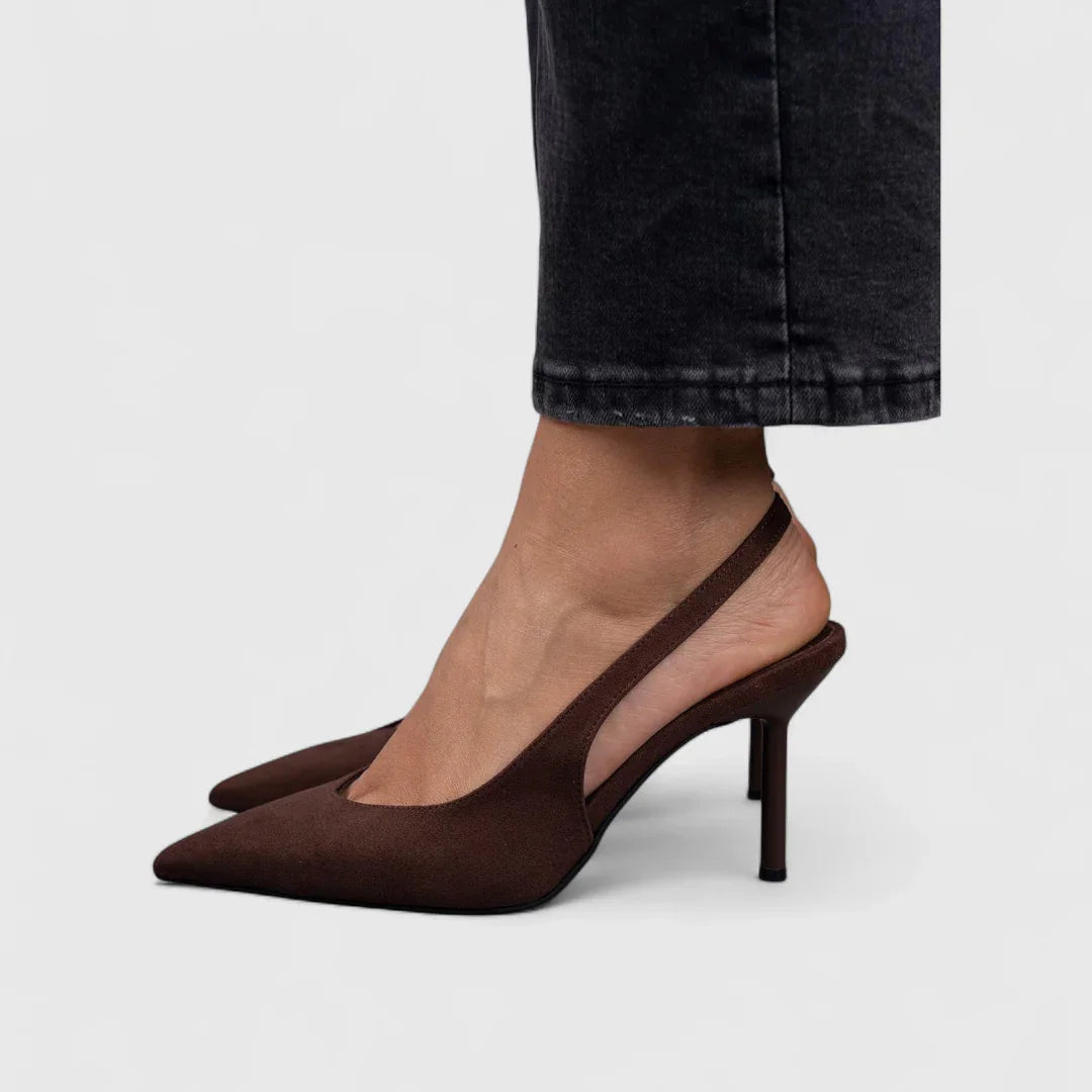 Brown pointed-toe heeled slingback with low block heel and smooth upper
