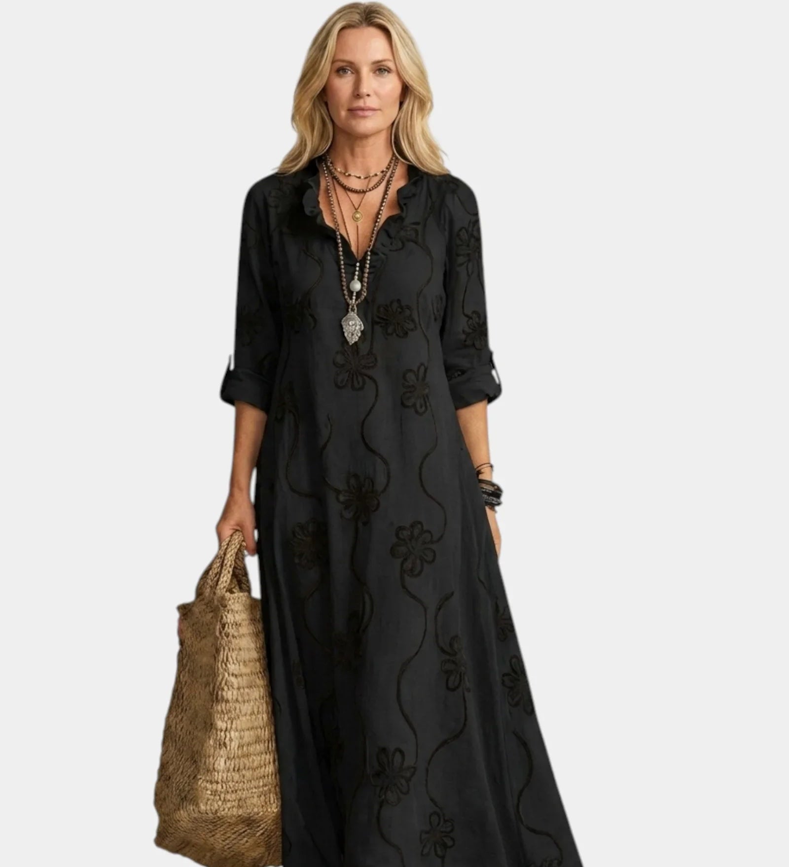 Black maxi dress with floral embroidery, V-neck, and three-quarter sleeves