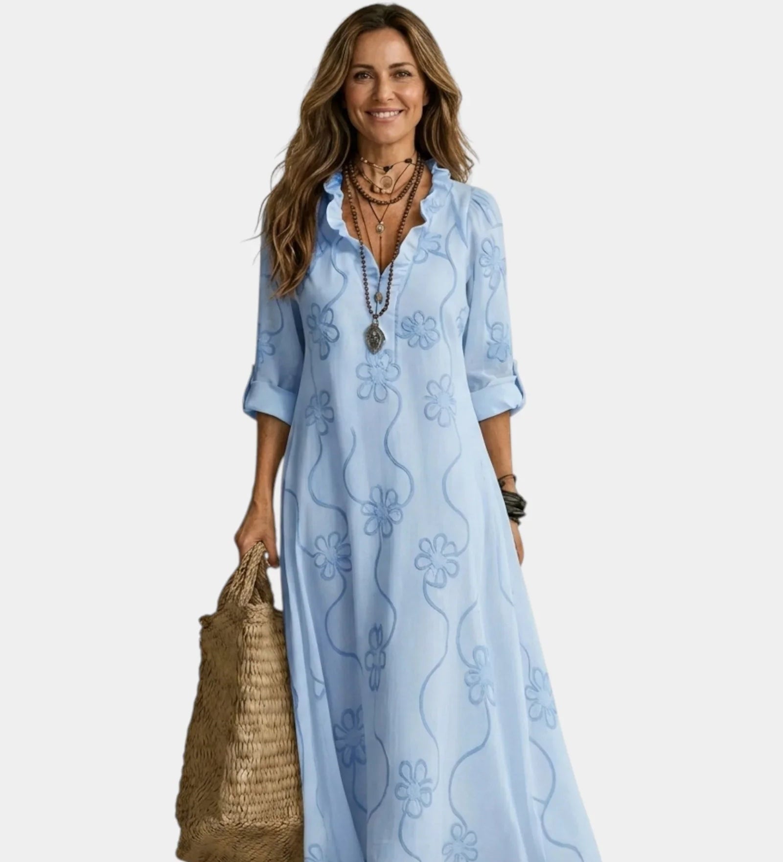 Light blue maxi dress with floral embroidery, V-neck, and three-quarter sleeves