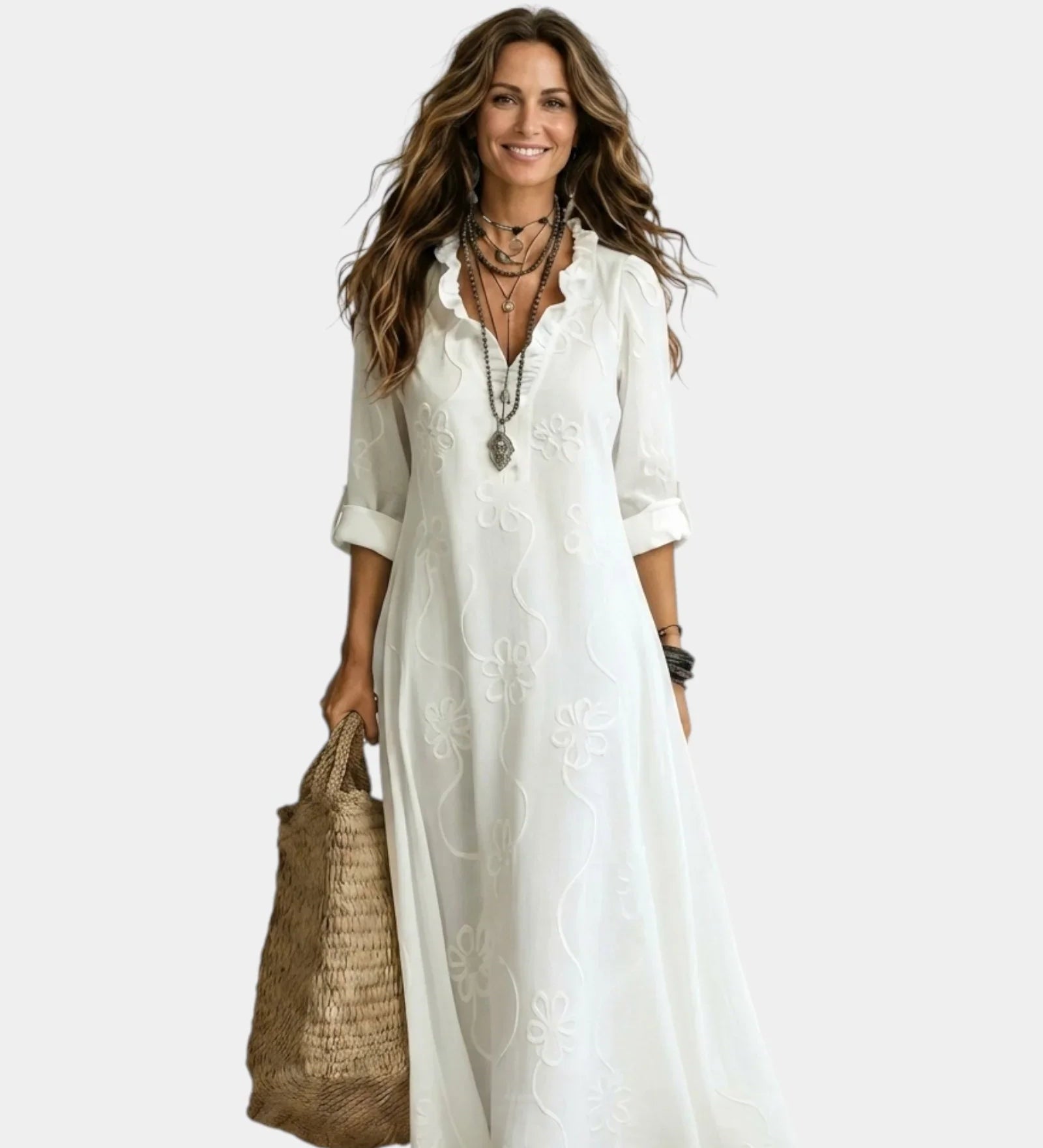 White maxi dress with floral embroidery, V-neck, and three-quarter sleeves