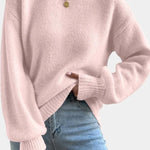 Pink round-neck sweater with puff sleeves and ribbed cuffs