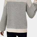 Back view: white crew neck sweater with black micro-check knit and ribbed hem