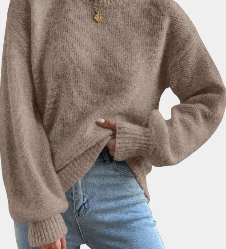Brown round-neck sweater with puff sleeves and ribbed cuffs