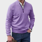 Purple half-zip knit sweater with ribbed collar, cuffs, and hem.