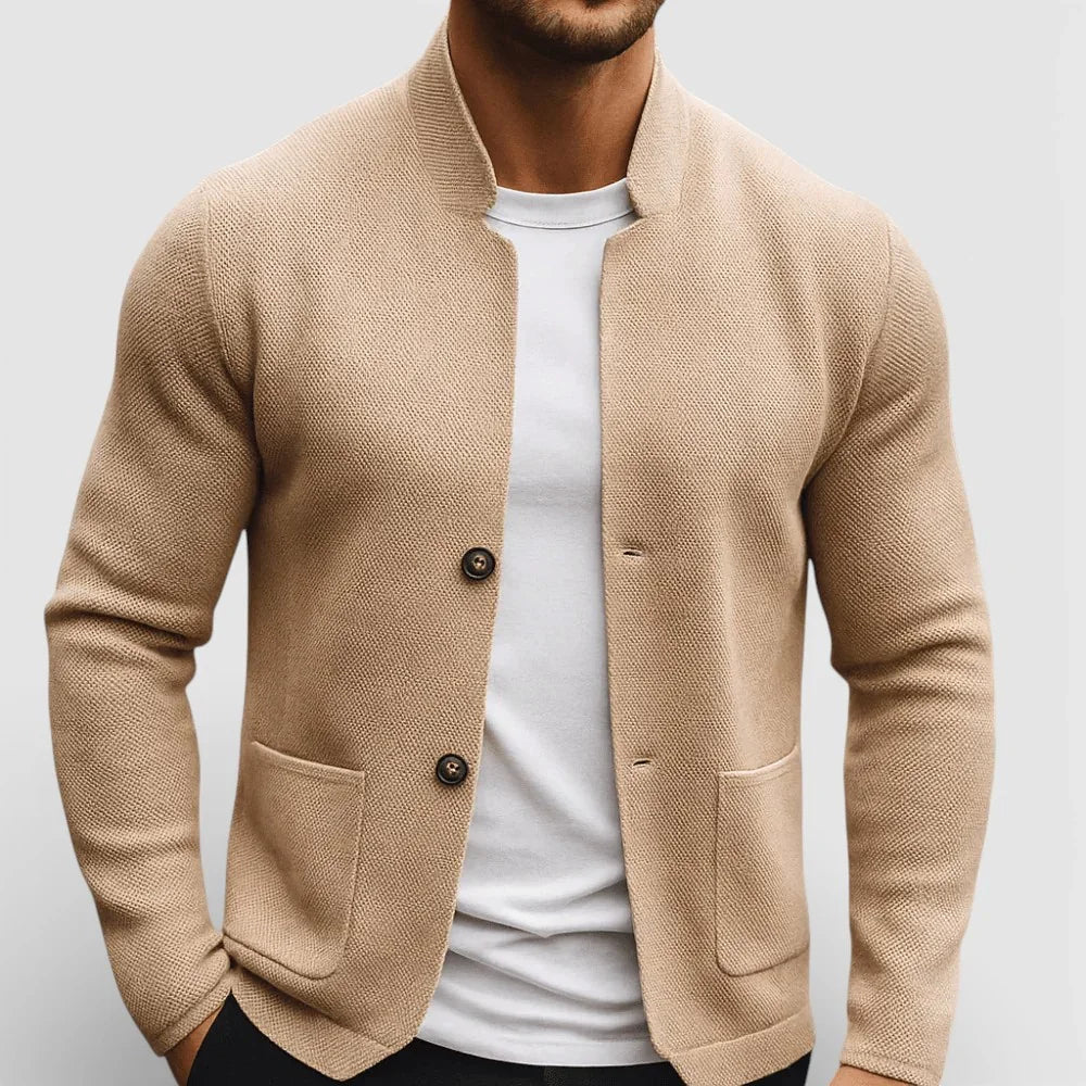 Beige knit blazer with two-button front and flap pockets
