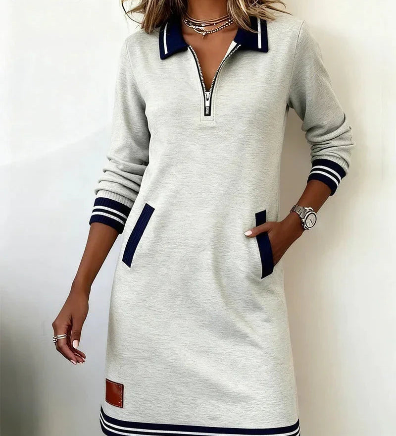 Light gray long cotton dress with quarter-zip, contrast collar, striped cuffs, front patch pockets