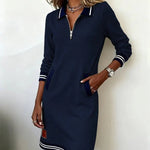 Navy long cotton dress with quarter-zip and contrast trim, striped cuffs, side pockets