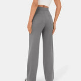 Medium gray wide-leg elastic waist pants with front button closure and side pockets