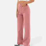 Blush pink wide-leg elastic waist pants with front button placket and side patch pockets