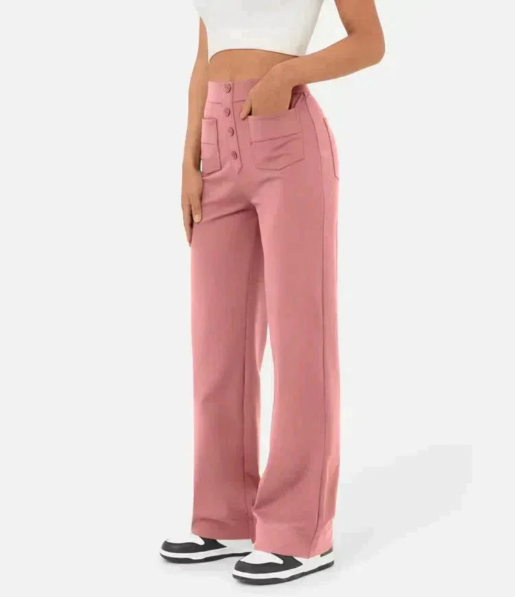 Blush pink wide-leg elastic waist pants with front button placket and side patch pockets
